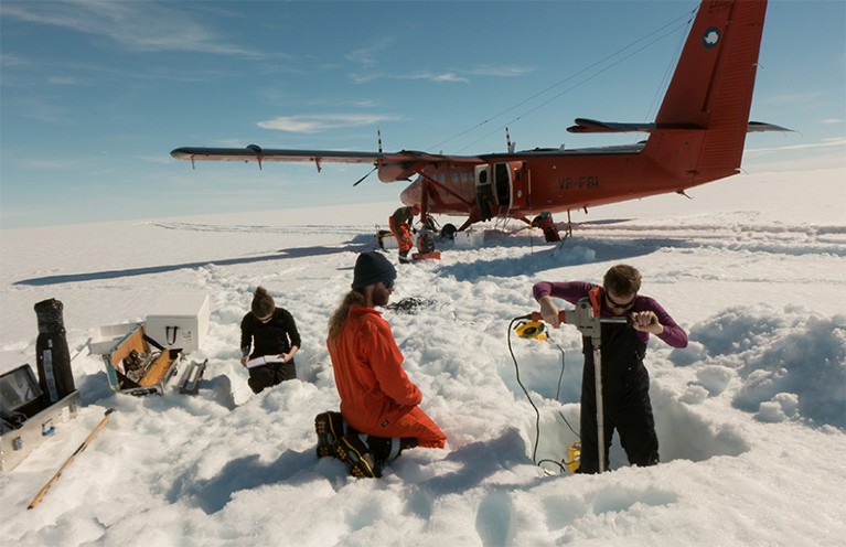 Photo of researchers collecting cores from the George VI Ice Shelf, Antarctica