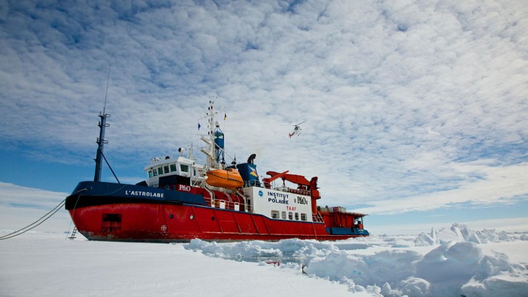 French icebreaker 'L'Astrolabe' moored on the edge of the fast ice off Dumont D'Urville station, Antarctica.