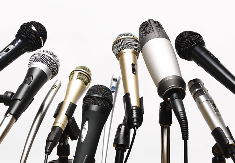A cluster of conference microphones