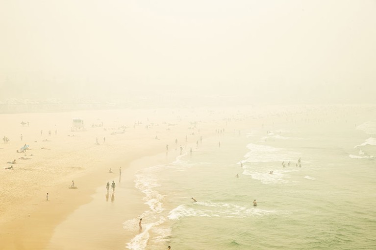 Smoke haze is seen over Bondi Beach as the air quality index reaches higher than ten times hazardous levels in some areas.