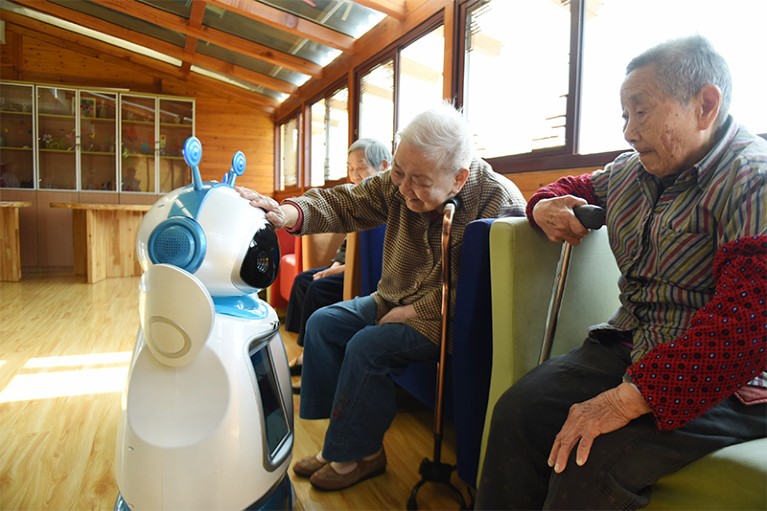 Elderly people interact with a service robot