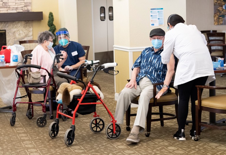 Residents get the COVID-19 vaccine at the Emerald Court senior living community in Anaheim