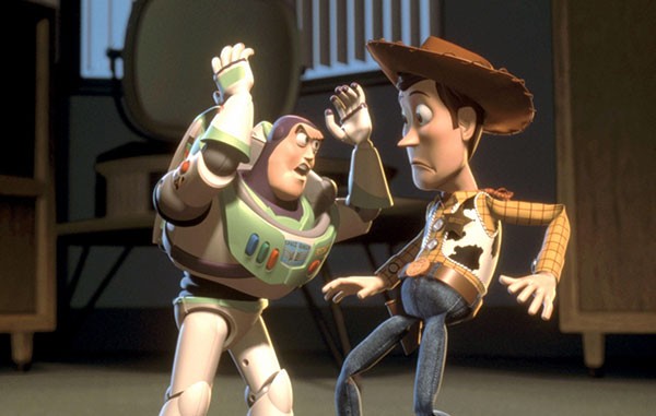 Buzz Lightyear gestures at Woody in a still from the film Toy Story