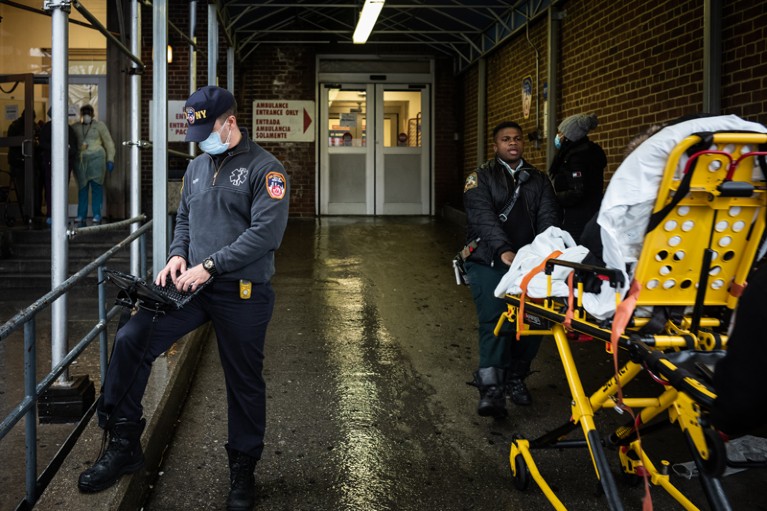 EMS personnel work outside the Emergency Department at St. Barnabas Hospital, NYC