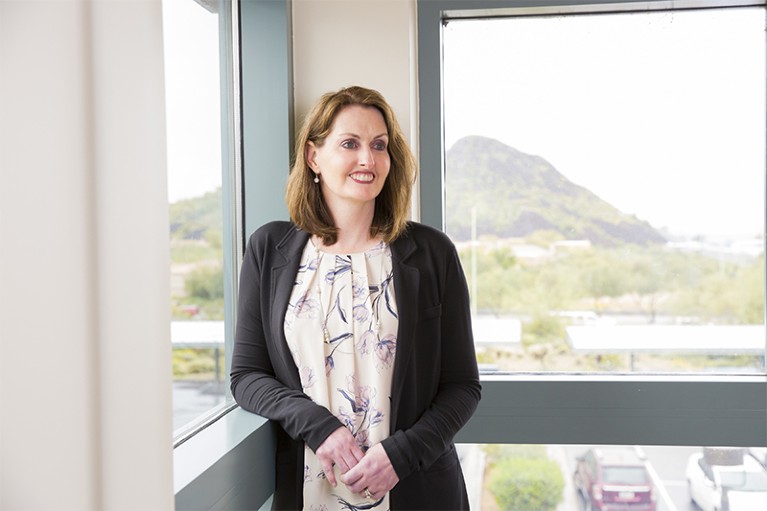 Heidi Kosiorek stands by a window