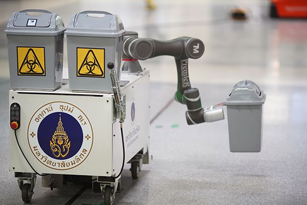 An infectious-waste-collection robot operates during a demonstration.