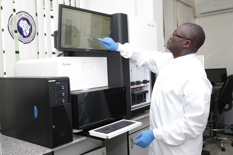 Christian Happi photographed at his lab.