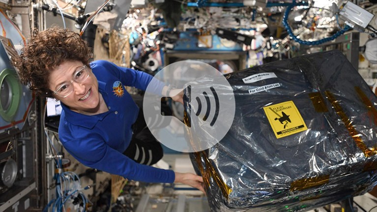 Astronaut Christina Koch unloads new hardware for the Cold Atom Lab aboard the International Space Station