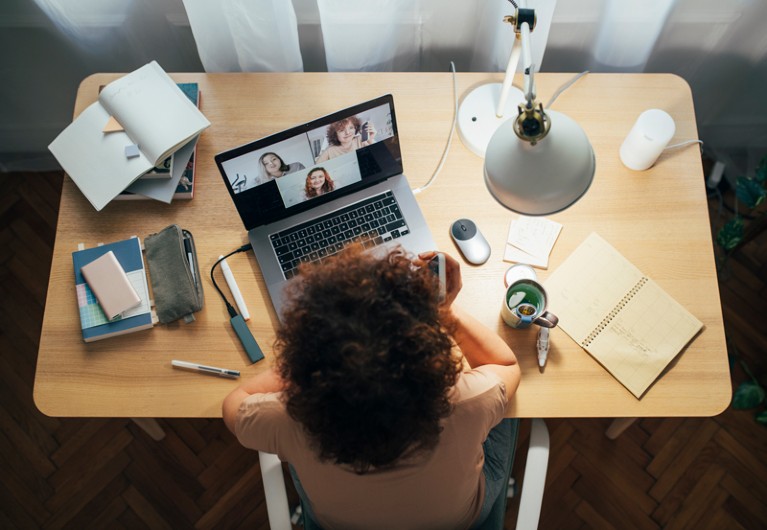 Woman teleconferencing from home