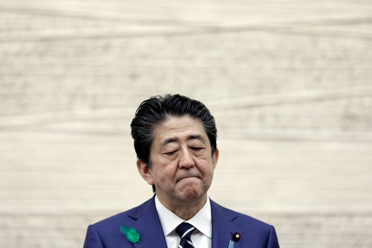 Shinzo Abe pausing during a news conference