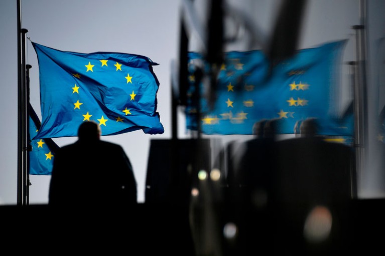 A man walks near the European Commission building