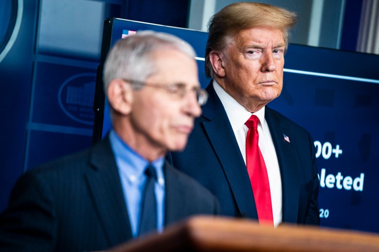 President Donald J. Trump listens to Dr. Anthony Fauci