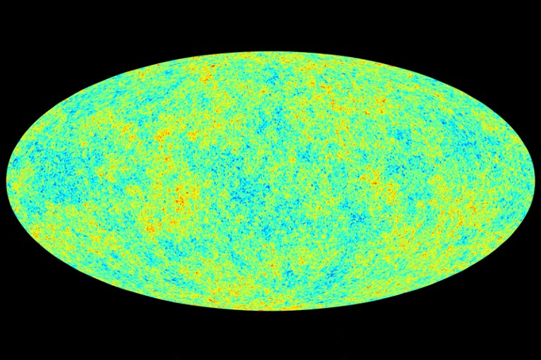 A green oval smattered with blue, yellow and red dots, on a black background.