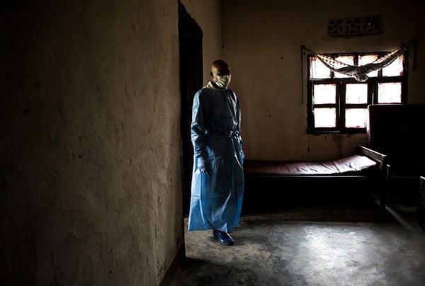 A health worker is seen in a hospital where suspected Ebola cases are referred to hospital, Aloya, Democratic Republic of Congo