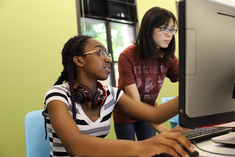 Photo of high-school student and a member of the program staff at Arizona State University AI4ALL's 2019 Summer Program