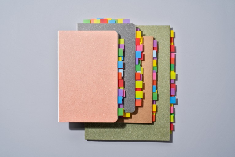 Colourful bookmarks on note pads