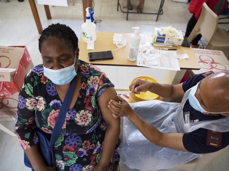 A health-care worker receives a dose of the Johnson & Johnson vaccine against the COVID-19 coronavirus, SA.