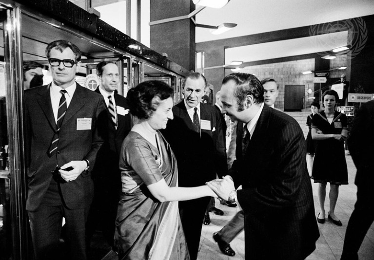 Indira Gandhi being greeted by Maurice Strong