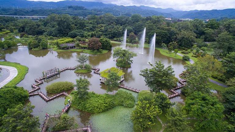 Photo shows an aerial view of Xishuanganna tropical botanic garden