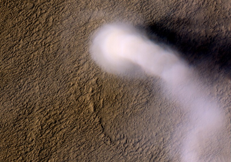 A Martian dust devil roughly 12 miles (20 kilometers) high