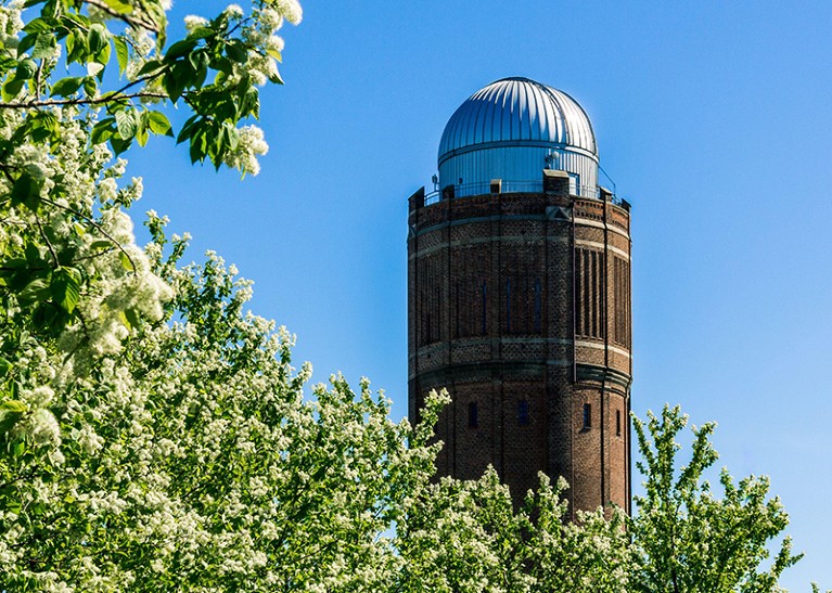 The old observatory with spring tree growth.