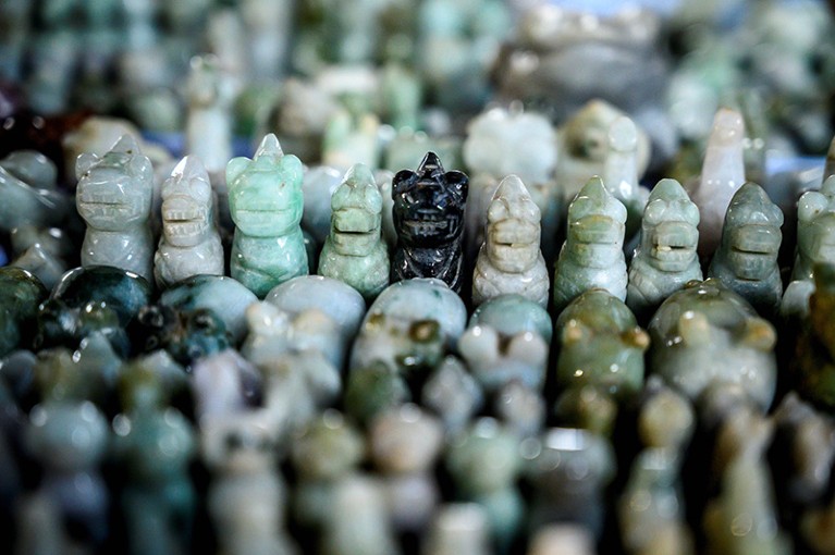 Jade figurines for sale at the Jade and Amber Market in Mandalay.