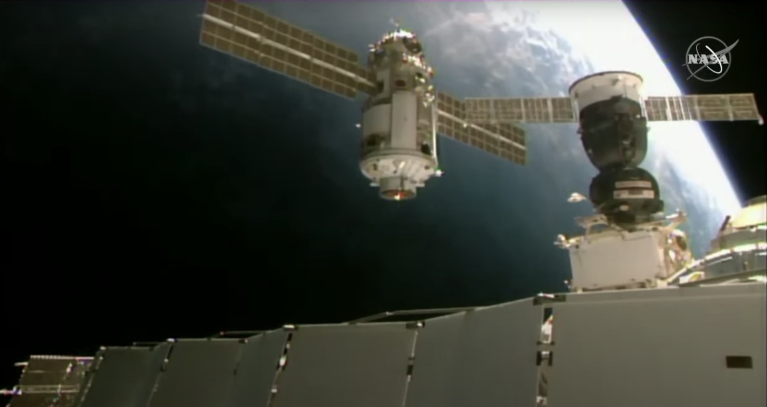 Nauka approaches the space station, preparing to dock