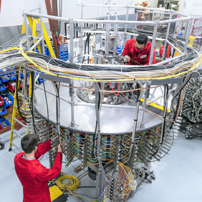 Technicians work on a key component of General Fusion’s Magnetized Target Fusion technology - the compression system.