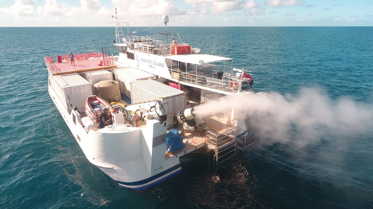 A boat using the sea-spraying cloud brightening system over the Great Barrier Reef in Australia during a 2021 trial.