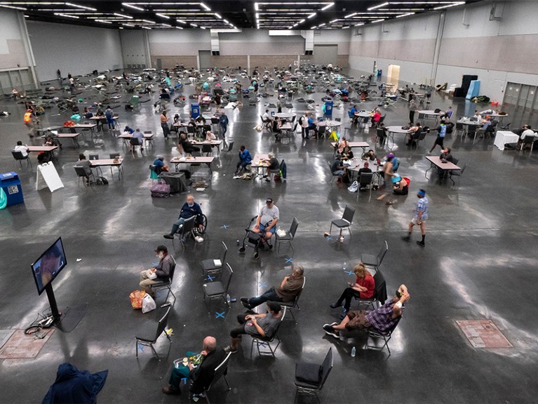 Portland residents fill a cooling center at the Oregon Convention Center June 27, 2021 in Portland, Oregon.