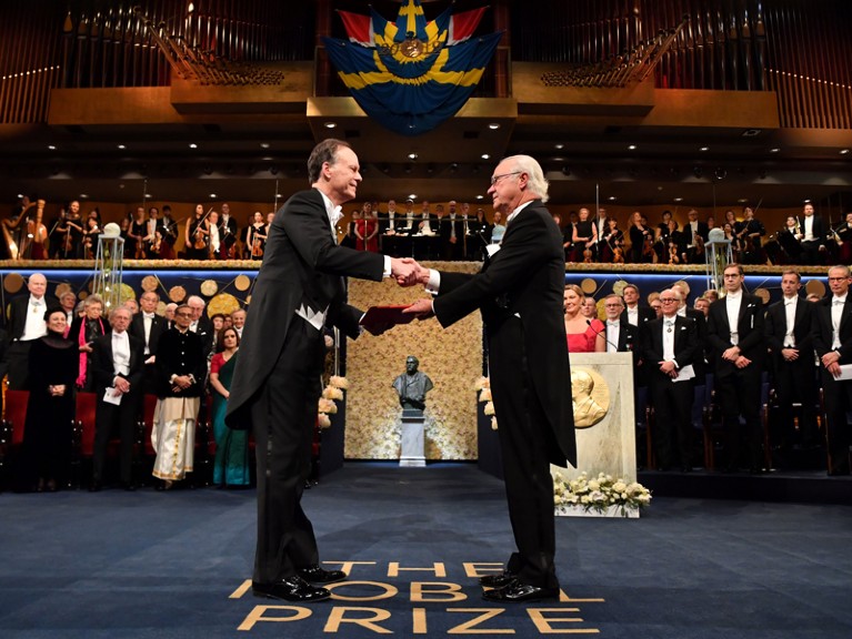 William G. Kaelin receives his Nobel Prize from King Carl XVI Gustaf of Sweden