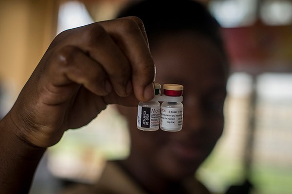 A nurse shows the malaria vaccine at the Ewin Polyclinic in Cape Coast, Ghana