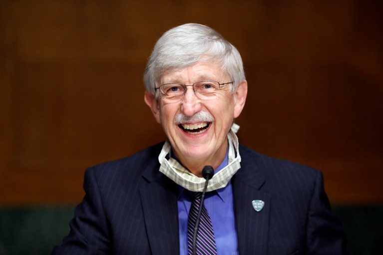 Dr. Francis Collins smiles as he speaks during a hearing