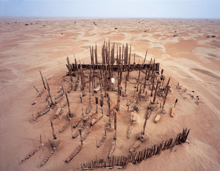 Aerial view of the Xiaohe cemetery surrounded by desert