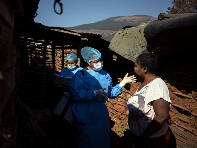 Nomautanda Siduna advises Pretty Mkhabela, a HIV-positive woman, at a mobile clinic in Ngodwana, South Africa.