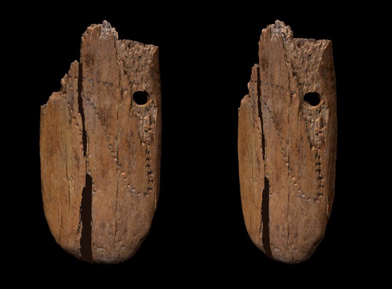 Dorsal and ventral views of an ancient pendant.