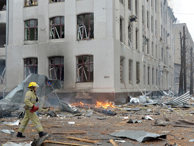 Firefighters work to contain a fire at the Economy Department building of Karazin Kharkiv National University, Ukraine.