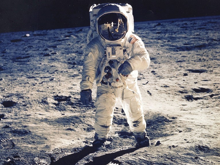 Aldrin Jr., Lunar Module Pilot, Is Photographed Walking Near The Lunar Module During The Apollo 11 Extravehicular Activity.
