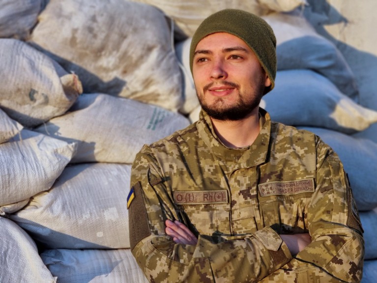 Valerii Pokrytiuk, Ukrainian master student currently volunteering in the army, portrayed in an unknown location.
