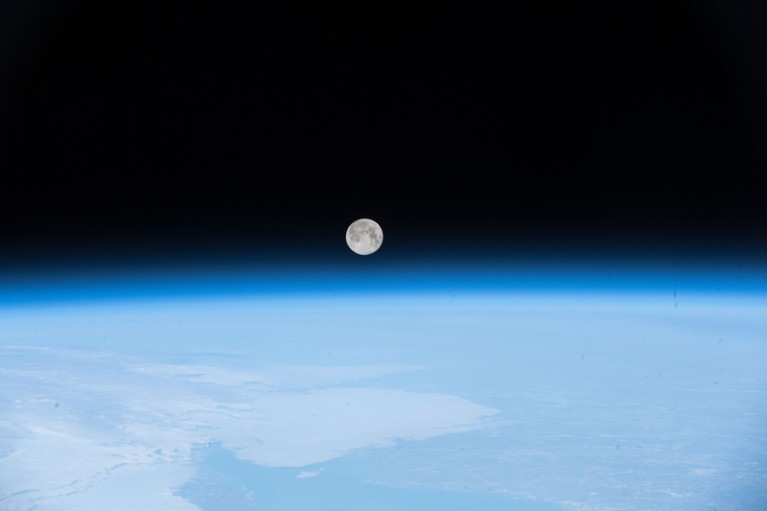 The full Moon pictured above Earth from the International Space Station.