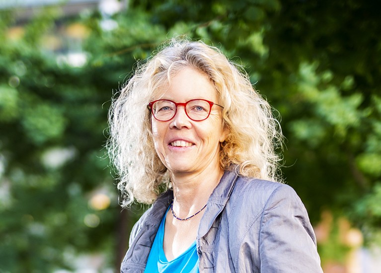 Ursula Eicker stands in front of trees at Concordia University