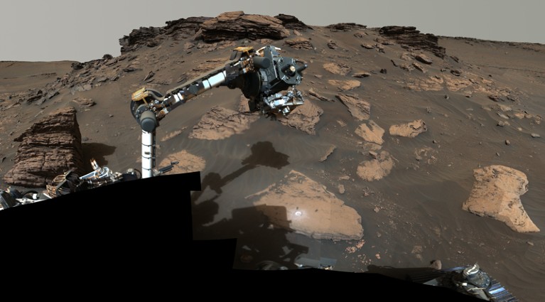 The robotic arm of the Perseverance rover working on a rocky outcrop called “Skinner Ridge” in Mars’ Jezero Crater