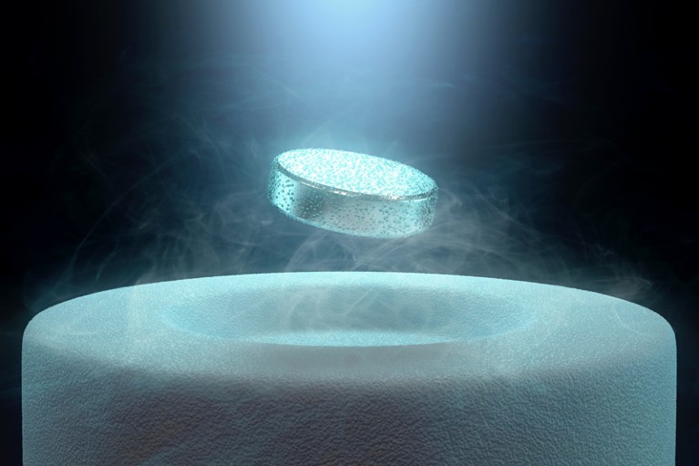 Illustration of a disc-shaped magnet levitating over a donut-shaped superconductor with clouds of liquid nitrogen coolant