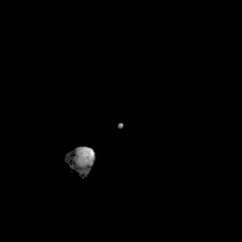Gif of footage of the DART spacecraft showing it moving past an asteroid Didymos and colliding with its small moon Dimorphos