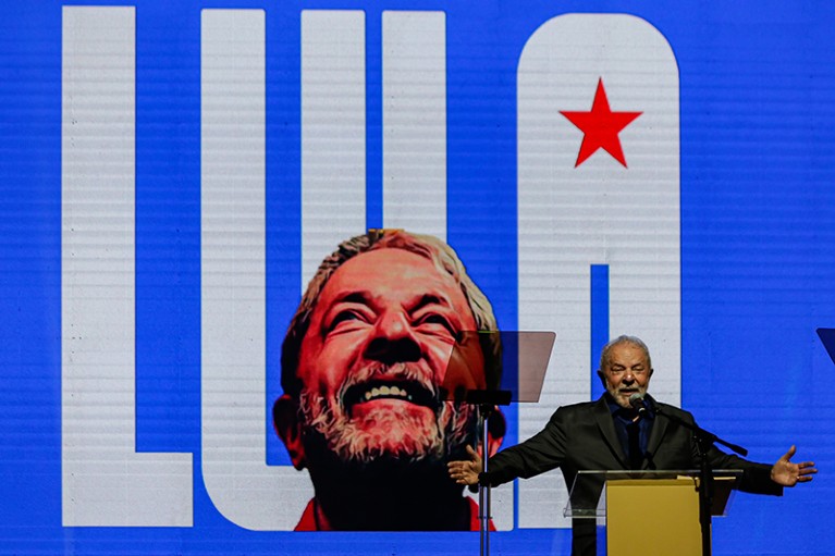 Presidential candidate Luís Inácio Lula da Silva gives a speech on a podium during a rally in São Paulo, Brazil.