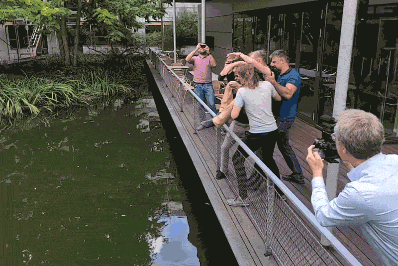 A video clip of Svante Pääbo being tossed over railings by his colleagues and splashing into a pond to celebrate his Nobel prize