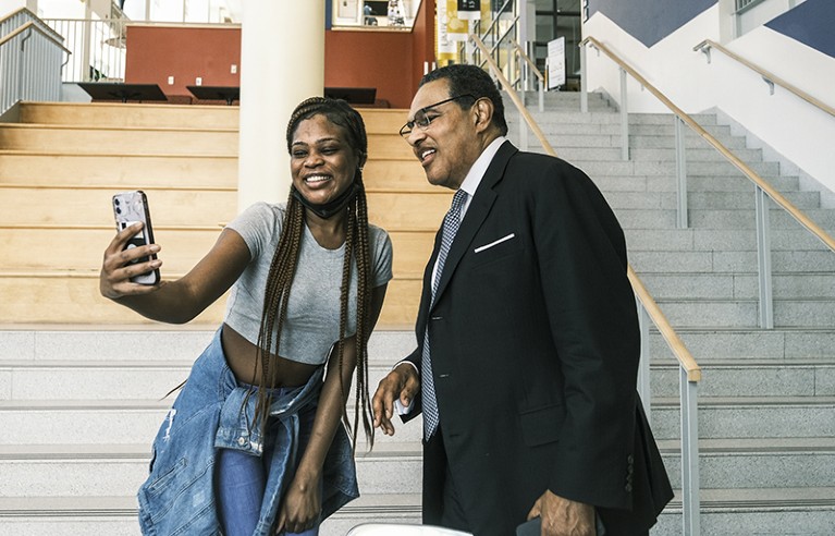 Freeman Hrabowski, President of the University of Maryland Baltimore County, takes a selfie with an incoming student, 2022.