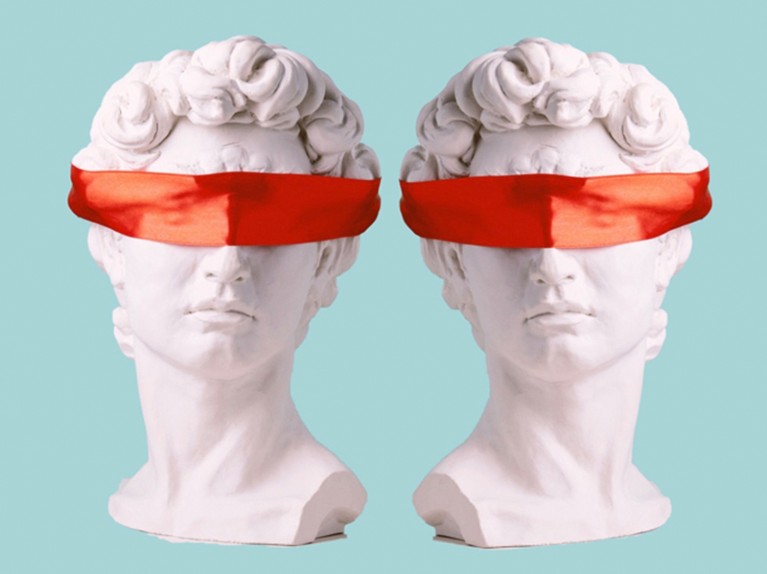 Caption: Plaster head with eyes covered red satin ribbon on blue background.