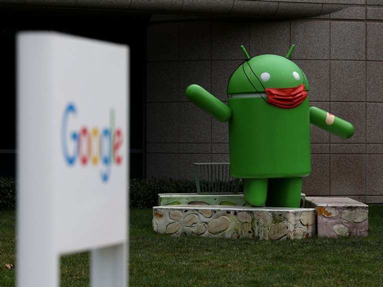 An Android statue is displayed in front of a building on the Google campus, California.