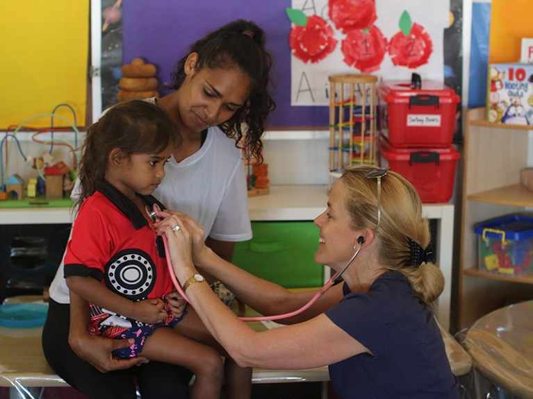 Four year old participant with her mother is being checked for chronic lung disease by Pamela Laird, Australia.